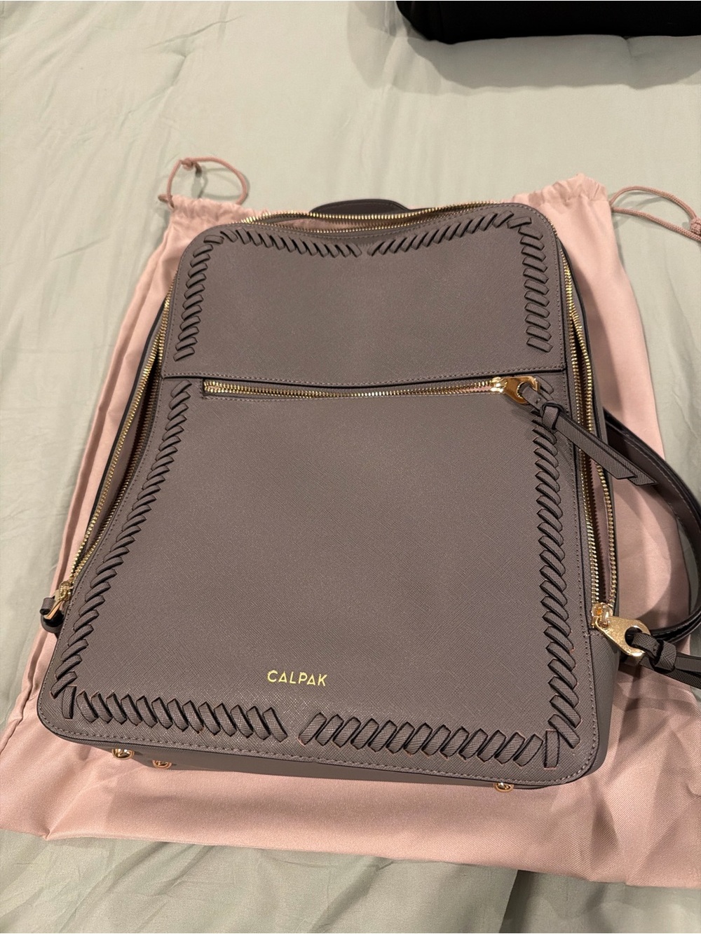 Beautiful Calpak structured backpack in like-new condition dust bag included